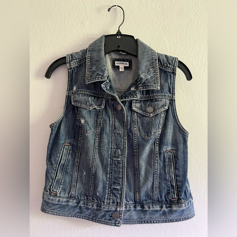 Distressed denim vest